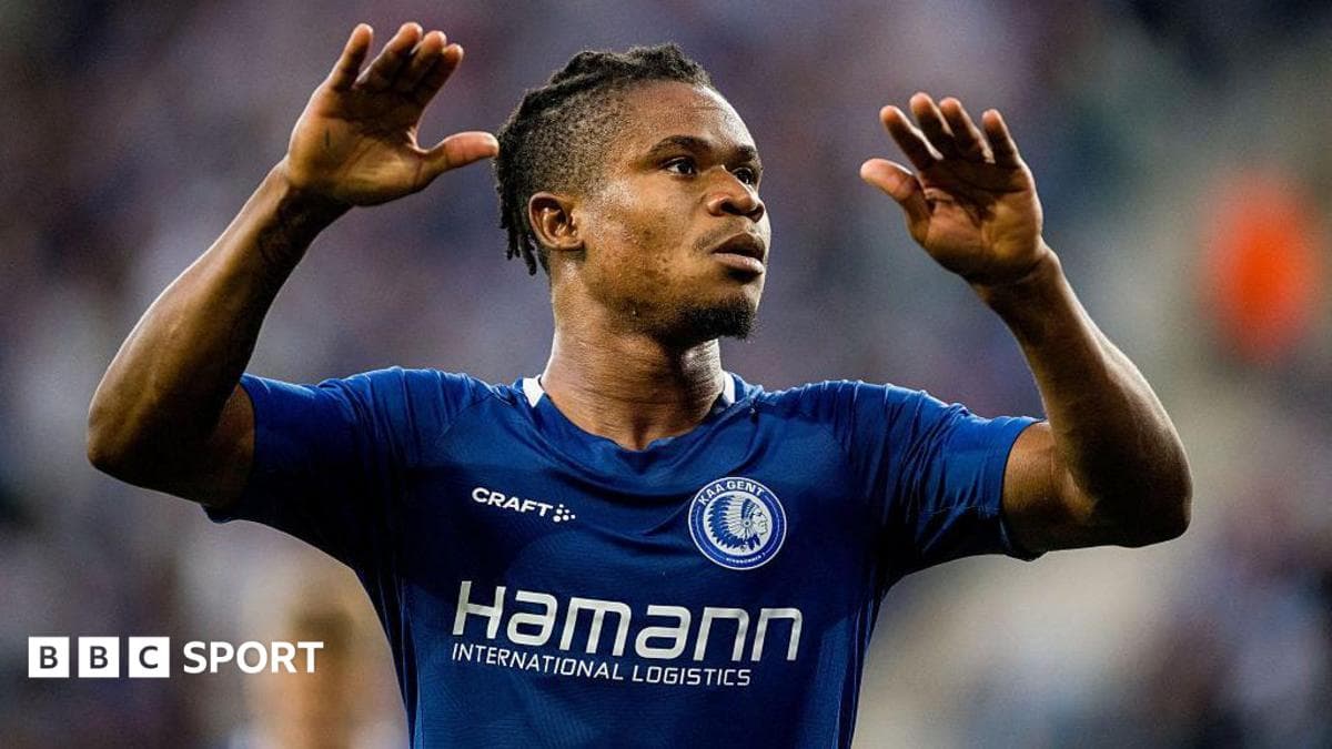 Football player holding ball in stadium symbolizing uncompleted transfers